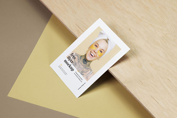 A6 Flyer on a Wooden Board Mockup