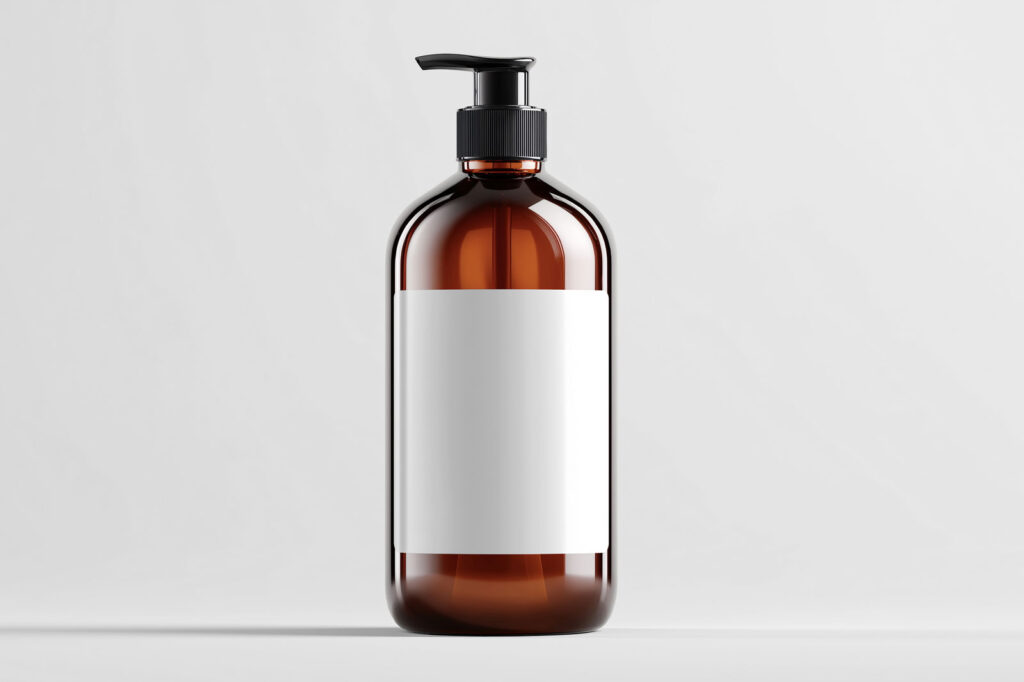 Amber Cosmetic Bottle Mockup in Studio Light
