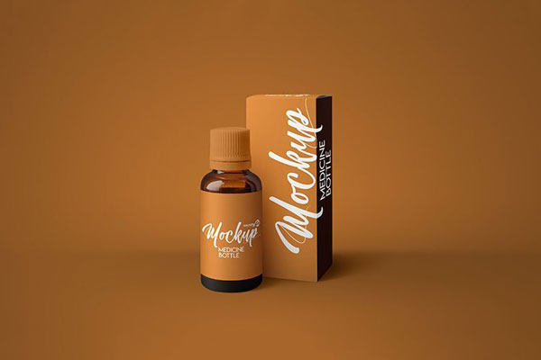 Amber Medicine Bottle Standing Next to Packaging Mockup