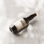 Animated Top View of Beer Amber Glass Bottle Mockup