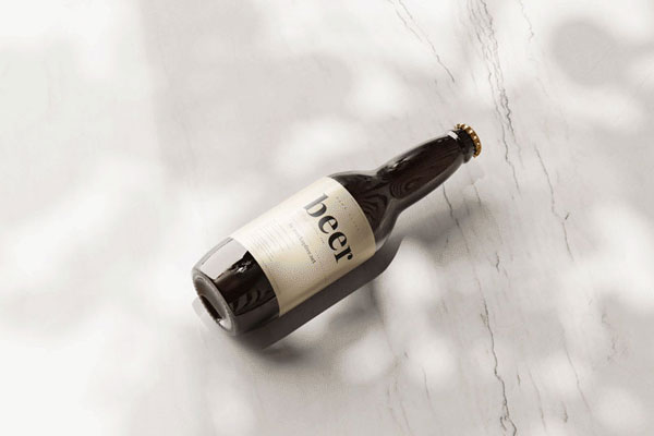 Animated Top View of Beer Amber Glass Bottle Mockup