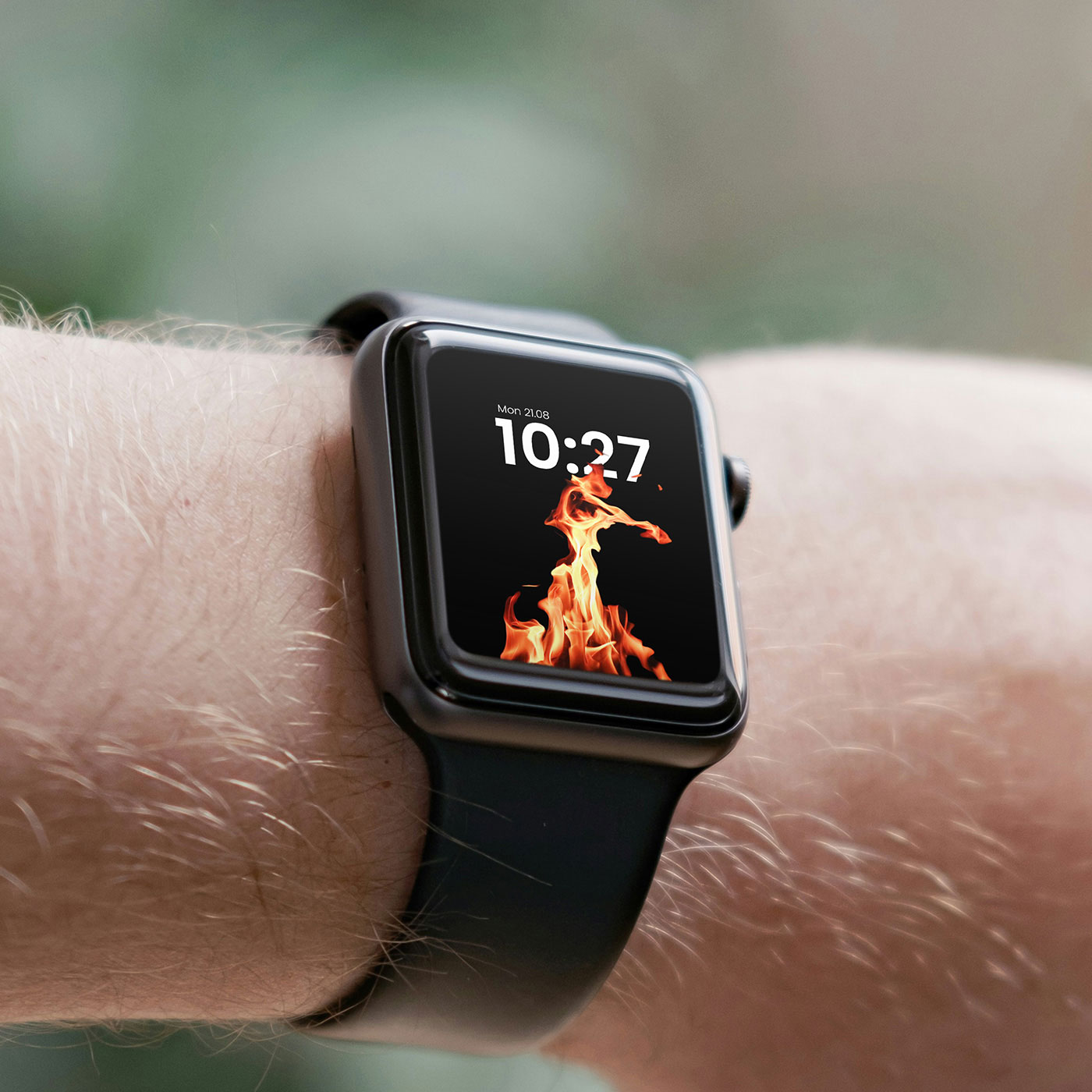 Free Apple Watch on Man Wrist Mockup PSD Template