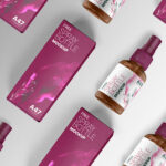 Arranged Rows of Spray Bottles With Boxes Mockup