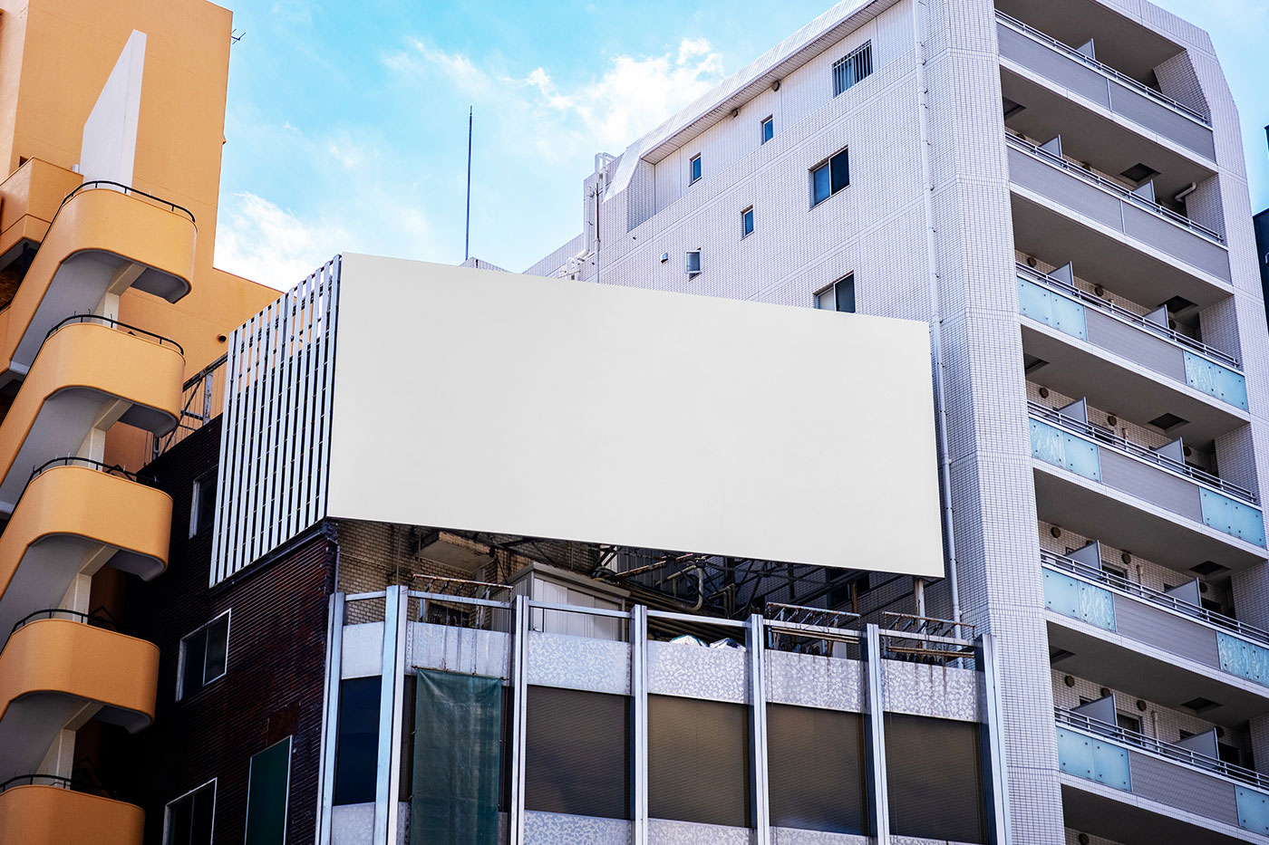 Free Billboard Between Buildings Mockup PSD Template
