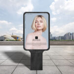 Billboard Mockup Showcasing a Female Model