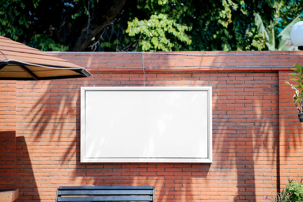 Billboard on Brick Wall Mockup