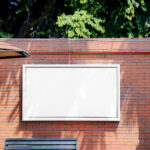 Billboard on Brick Wall Mockup