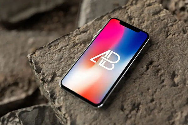 Black iPhone X Mockup On Rocks