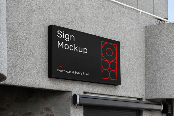 Building Sign Mockup on Top of a Grey Building