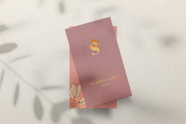 Business Card in Front of a Wall with Leaves Shadow Mockup