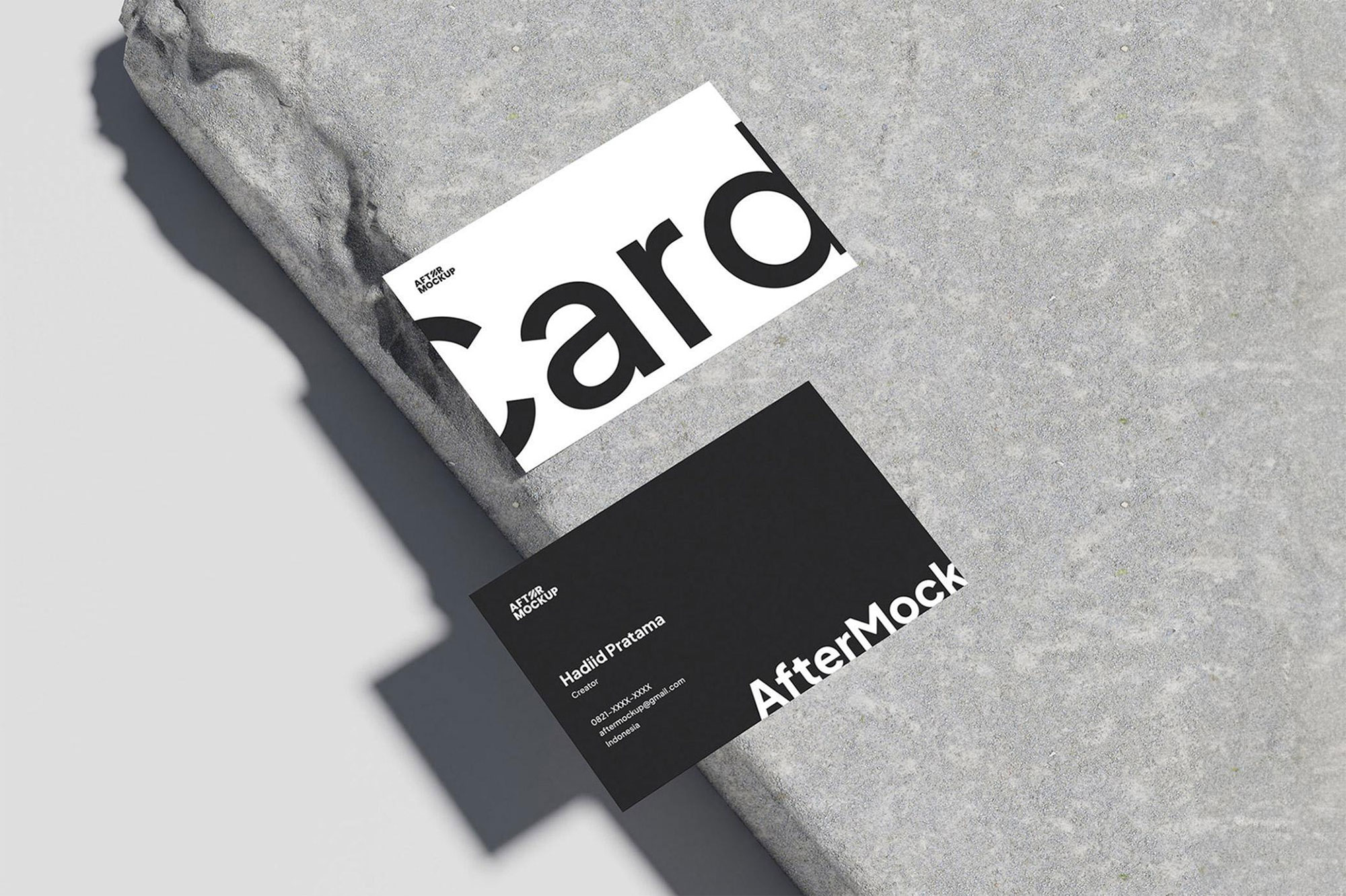 Free Business Card Mockup on Concrete PSD Template