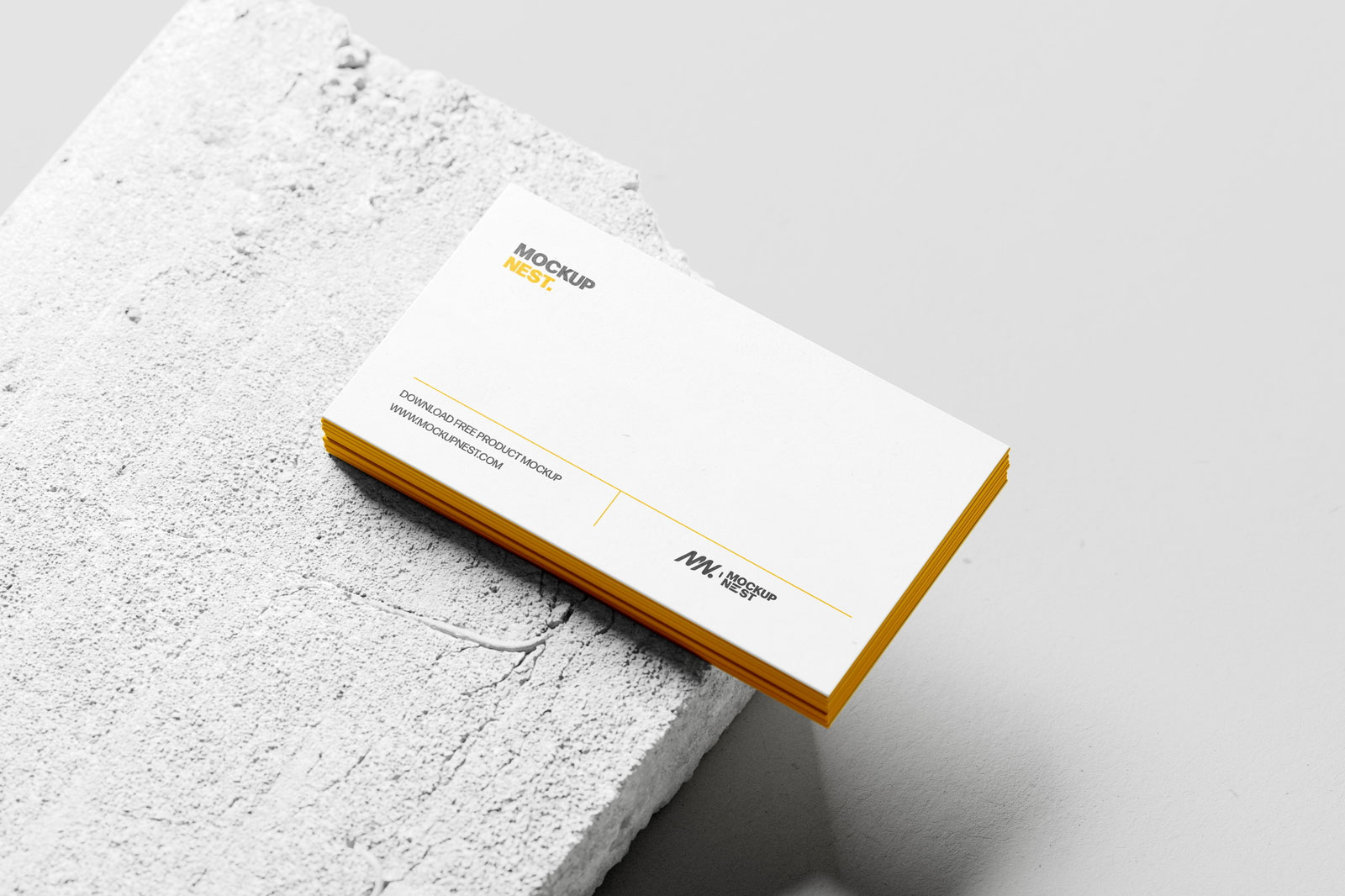Free Business Card Mockup Stacked on Concrete PSD Template