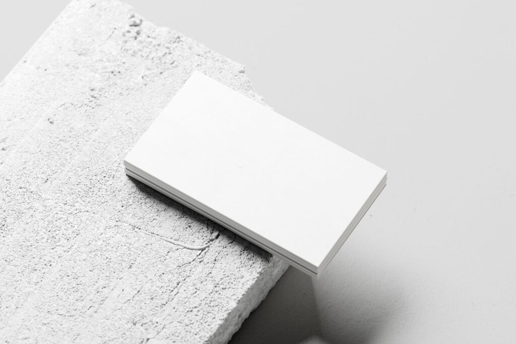 Business Card Mockup Stacked on Concrete