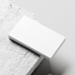 Business Card Mockup Stacked on Concrete