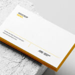 Business Card Mockup Stacked on Concrete