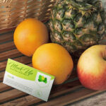 Business Card Mockup with Oranges, Apple, and Pineapple
