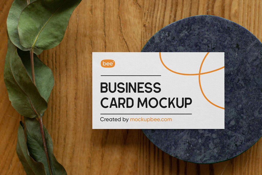 Business Card on Stone Mockup with Plant From Top Angle