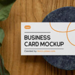 Business Card on Stone Mockup with Plant From Top Angle
