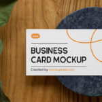 Business Card on Stone Mockup with Plant From Top Angle