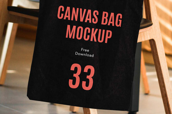 Canvas Bag Hanging on the Side of a Wooden Chair Mockup