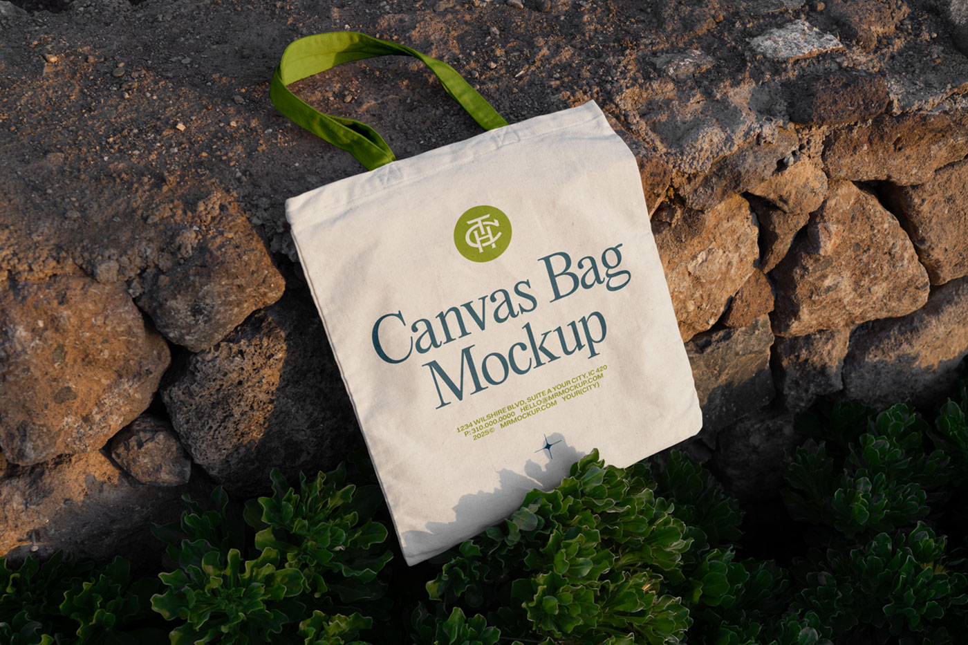 Free Canvas Bag Laying on Stones Mockup PSD Template
