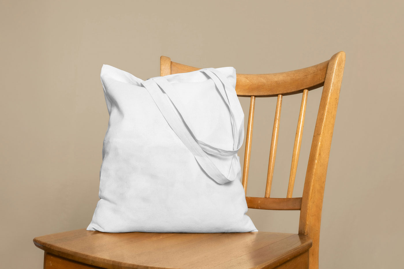 Free Canvas Bag on Chair Mockup PSD Template