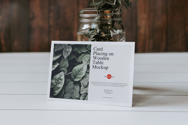 Card Placing on Wooden Table Leaning to a Jar Mockup