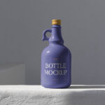 Ceramic Bottle Standing on Concrete Mockup in Front Angle
