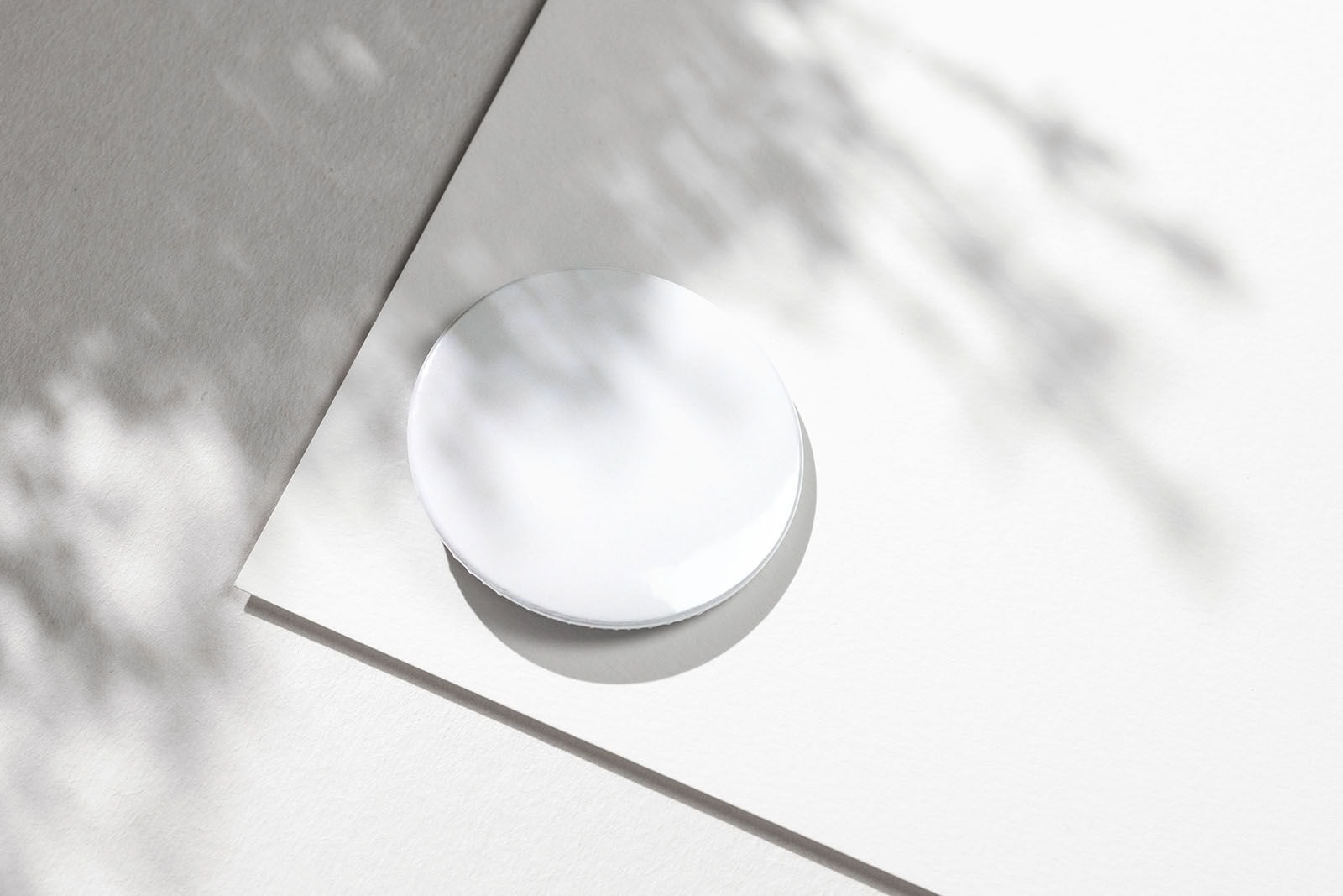 Close-up View of a Round Badge Mockup FREE PSD