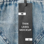 Close-up View of Thin Label Mockup with Jeans