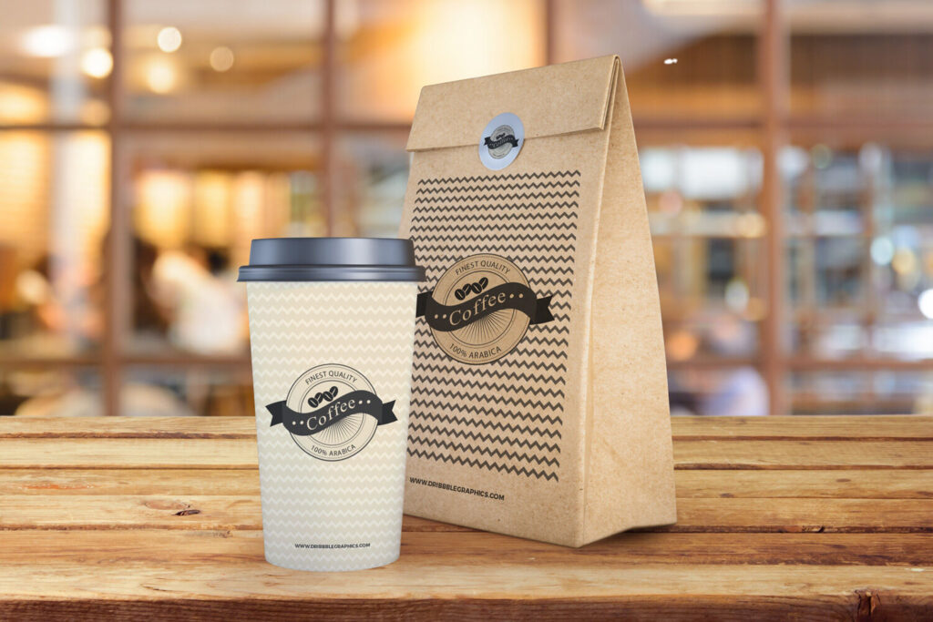 Coffee Cup and Paper Bag on Wooden Texture Mockup