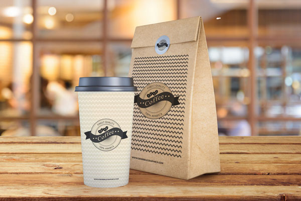 Coffee Cup and Paper Bag on Wooden Texture Mockup