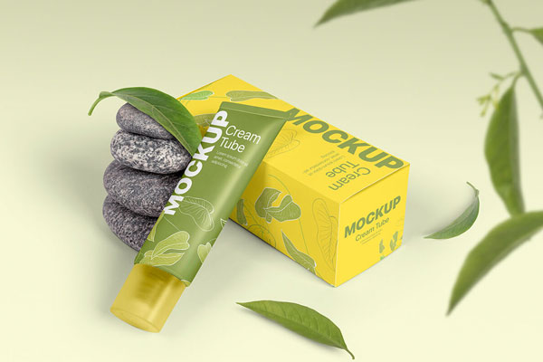 Cosmetic Tube and Packaging Box Mockup with Stones and Leaves