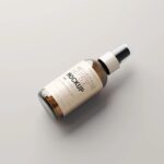 Different Sights of Amber Glass Spray Bottle Mockups
