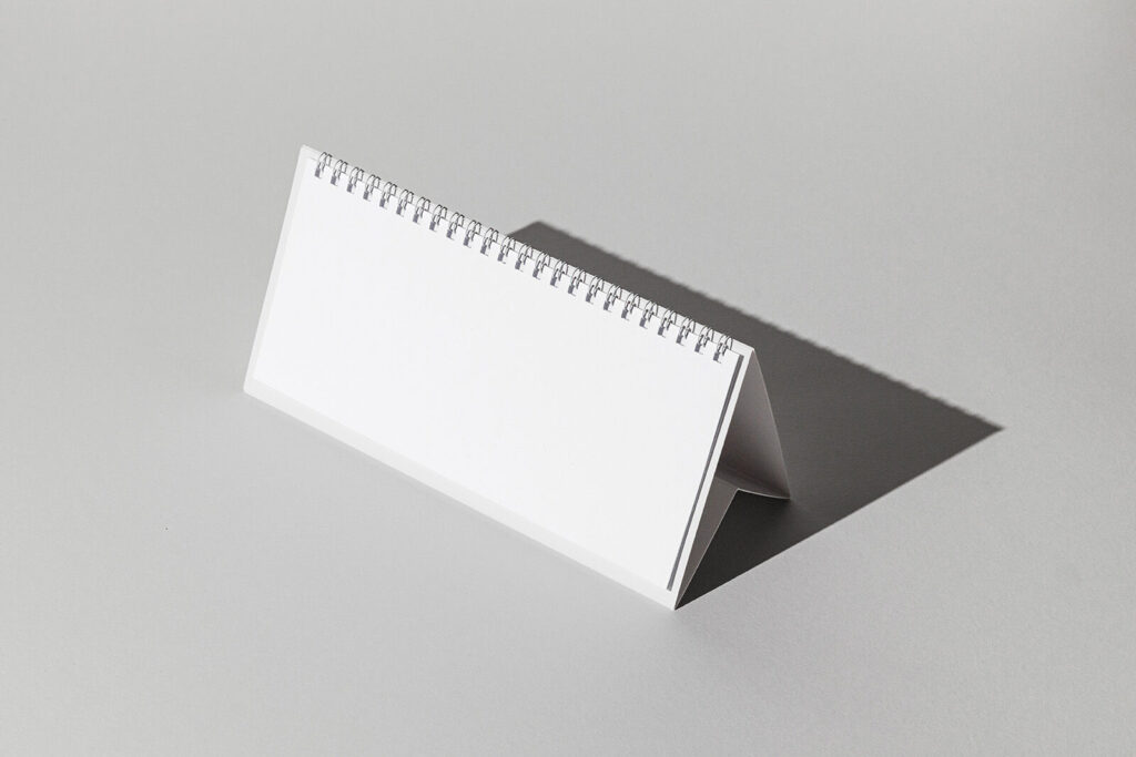 DL Desk Calendar Mockup Put at the 34 Angle View