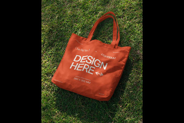 Dropped Tote Bag on Grass Mockup