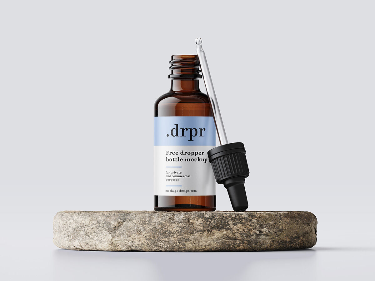 Dropper Bottle And Dropper On A Rock Mockup FREE PSD