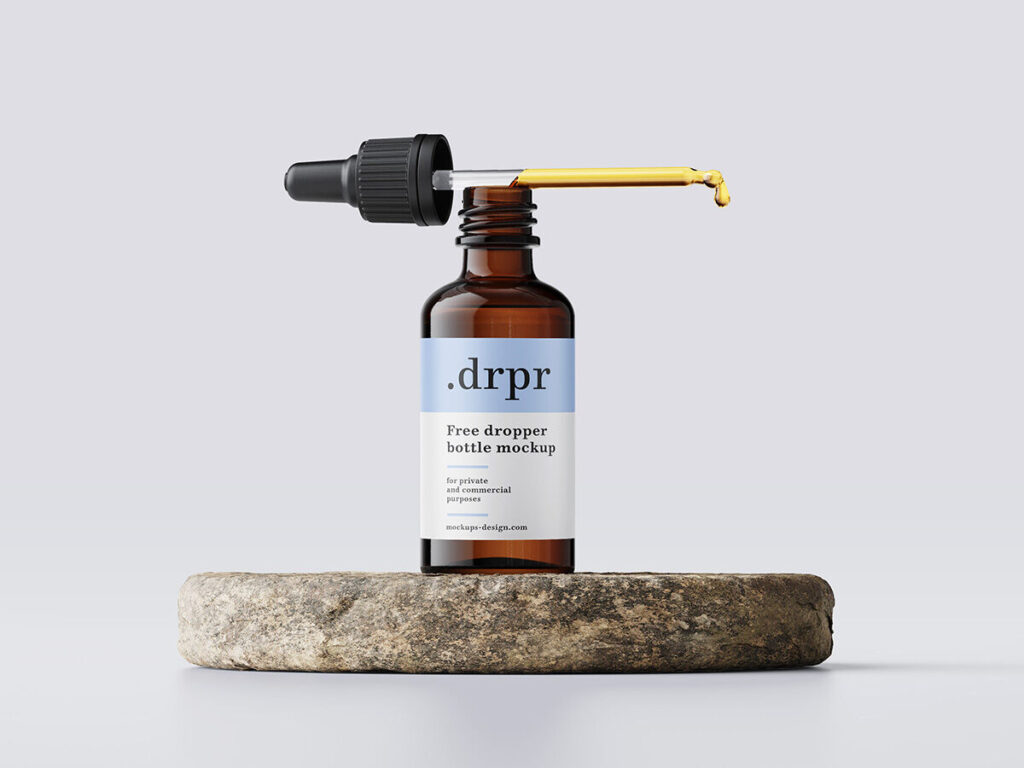 Dropper Bottle and Dropper on a Rock Mockup