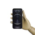 ٍiPhone 12 in a Wooden Hand Mockup