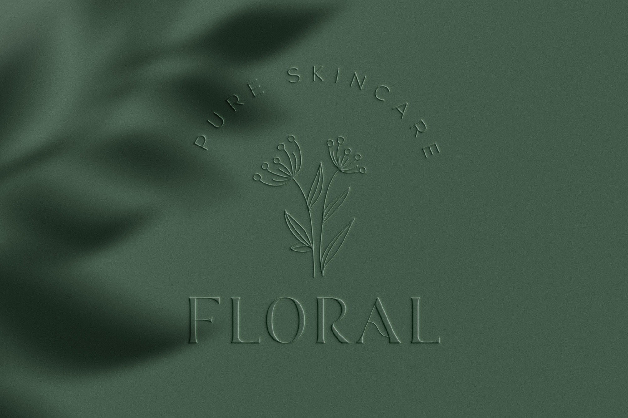 Free Embossed Effect Logo Mockup PSD Template