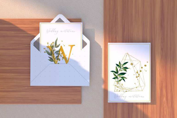 Envelope and Letterhead on a Wooden Surface Mockup