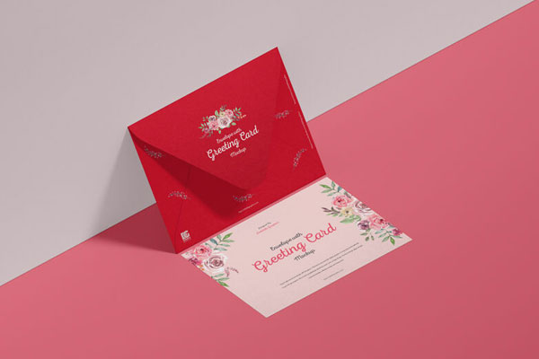 Envelope Leaning Against Wall with Greeting Card on Floor Mockup