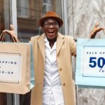 Excited Man Holding Shopping Bags Mockup