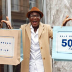 Excited Man Holding Shopping Bags Mockup