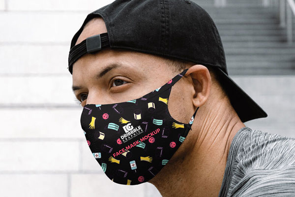 Face Mask Mockup Featuring a Man Wearing it in Half-Side View