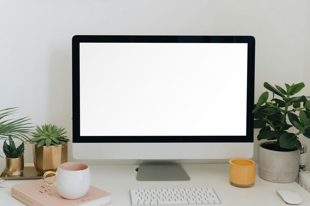 Facing Shot of iMac Mockup with Plants
