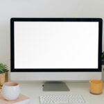 Facing Shot of iMac Mockup with Plants