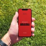 Facing Sight of iPhone 13 Mini Mockup in Hand