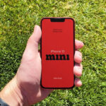 Facing Sight of iPhone 13 Mini Mockup in Hand