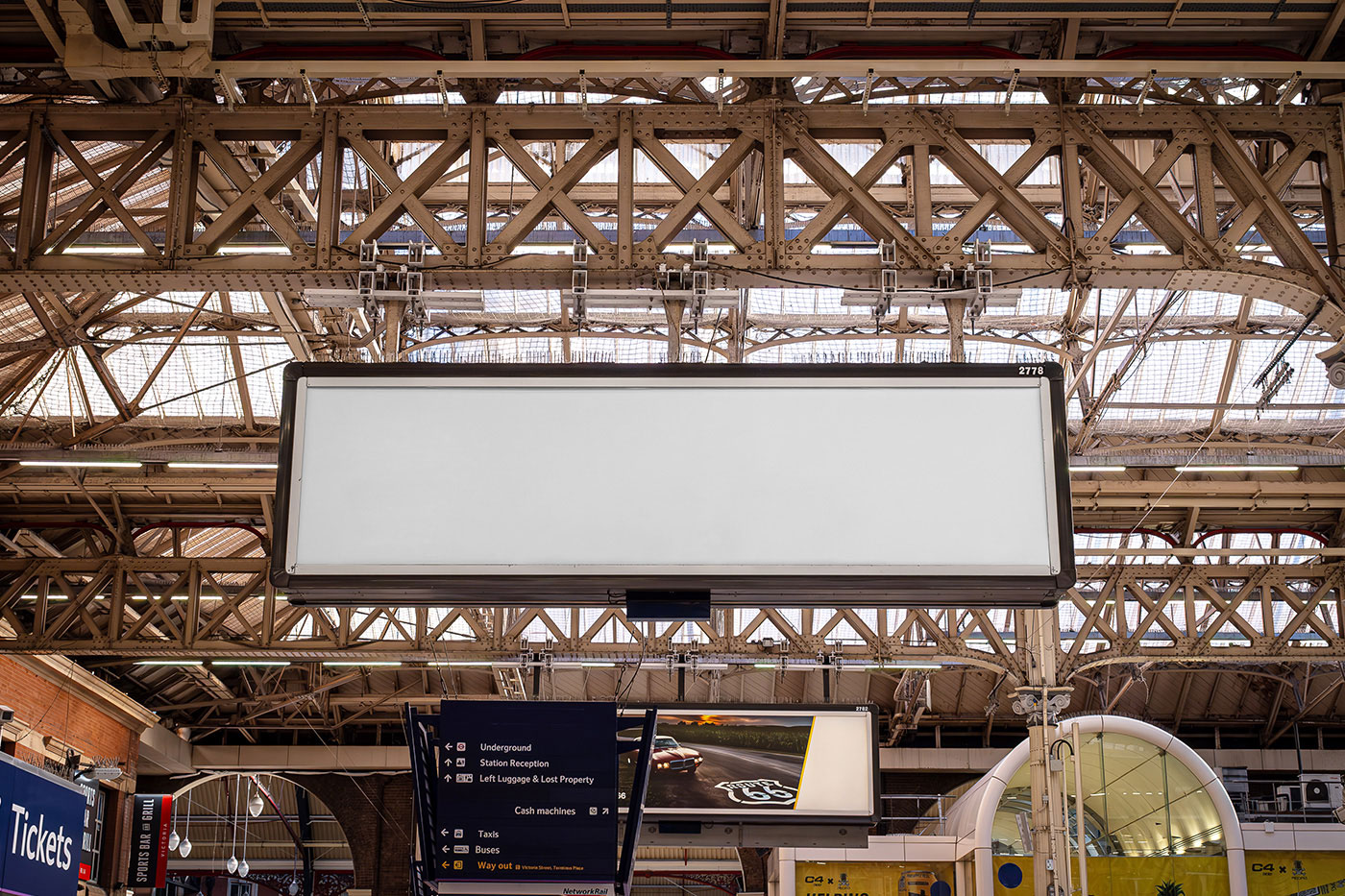 Free Facing Sight of Victoria Station Billboard Mockup PSD Template